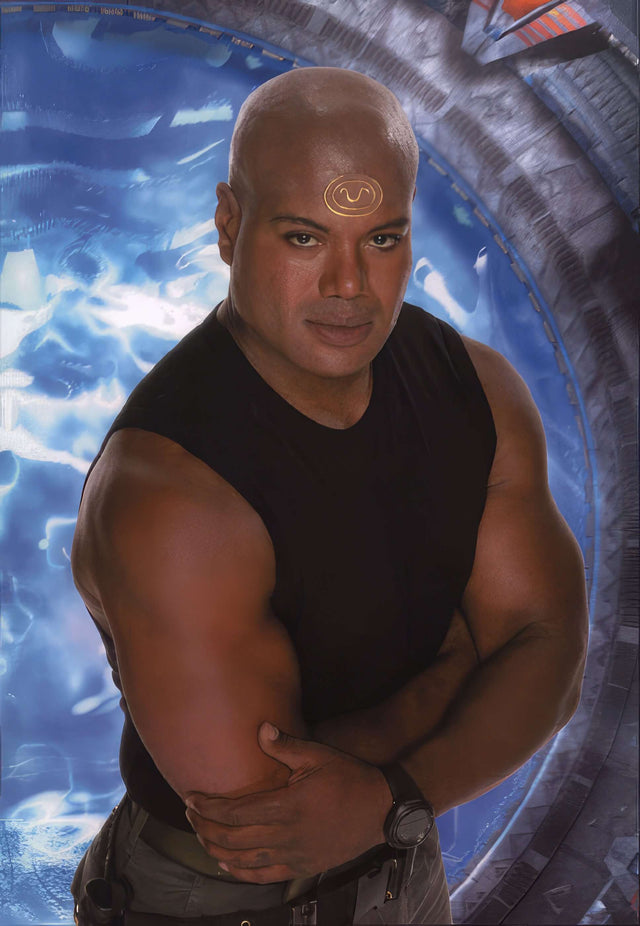 Teal'c artwork featuring Chris Judge in front of a Stargate portal, 8"x10" print, signed by Chris Judge.